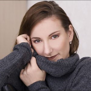 Das Foto zeigt Melodie Bongers während eine Foto-Session im Fotostudio Ochtrup – der Slogan „ Emotionale Menschenfotografie “ mit Thomas Schoo – in der Frühzeit des Fotostudio Ochtrup